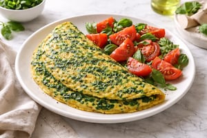 Omelette de espinaca y hierbas frescas