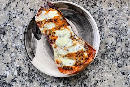 Calabaza rellena con lentejas y queso