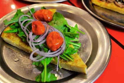 Fainá con queso sardo
