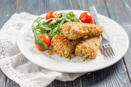Merluza rebozada con avena